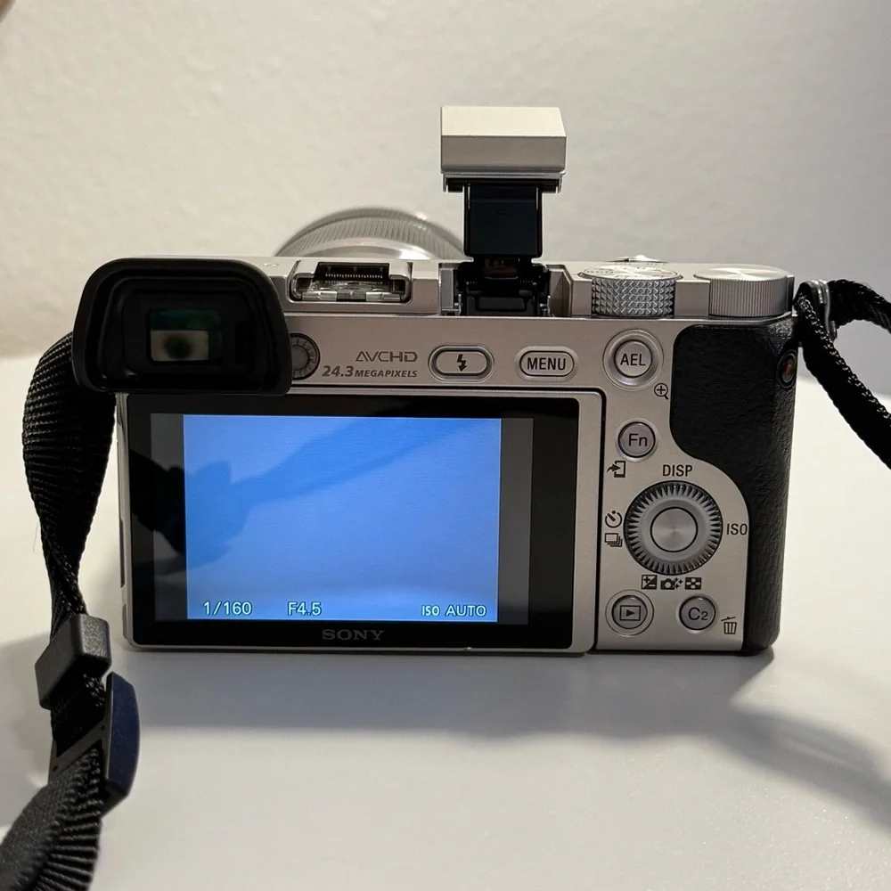Sony a6000 - 24.3 MP Mirrorless Camera Body & 55‑210mm OSS Lens - Silver